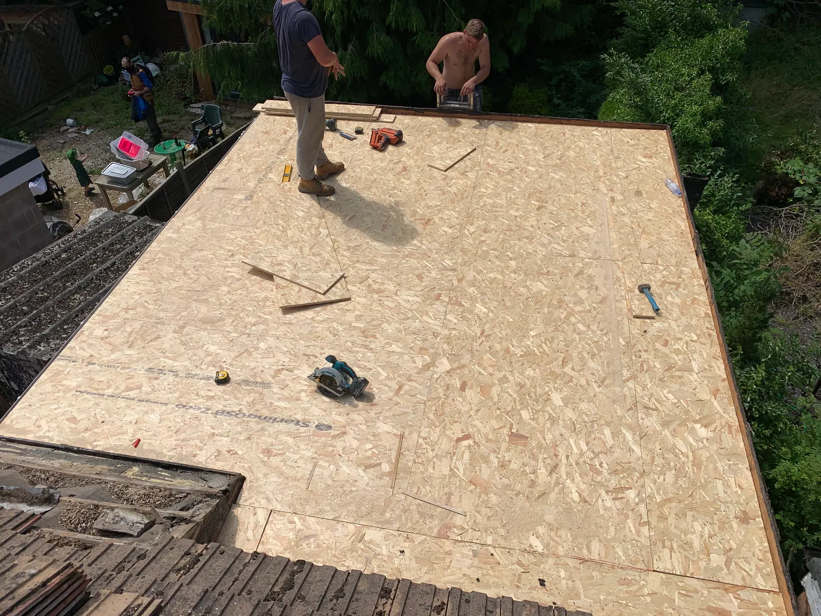New timber deck on a flat roof before covering