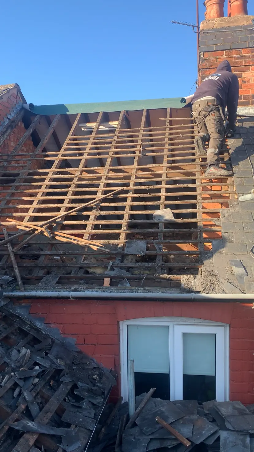 Old roof stripped back to the rafters during a re roof